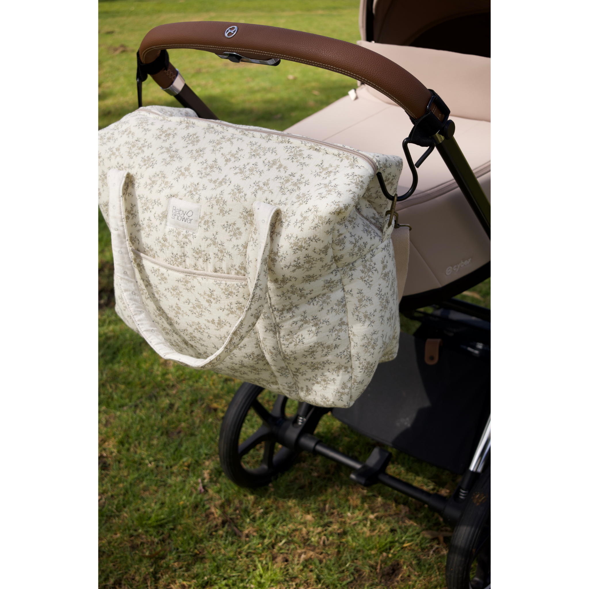 תיק החתלה "קמילה" מכותנה אורגנית - מעוטר בעלים אפורים