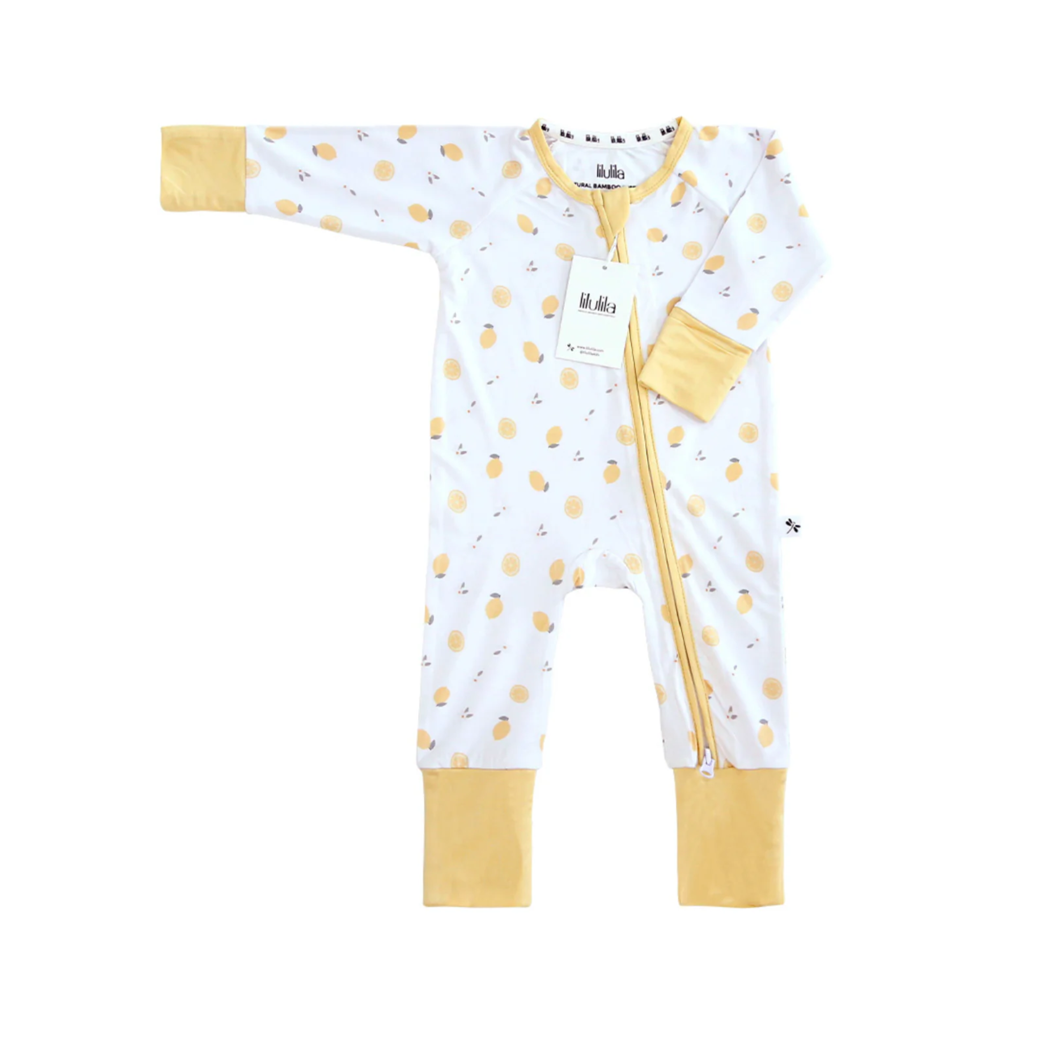 אוברול רוכסן -בצבע לבן מעוטר בלימונים