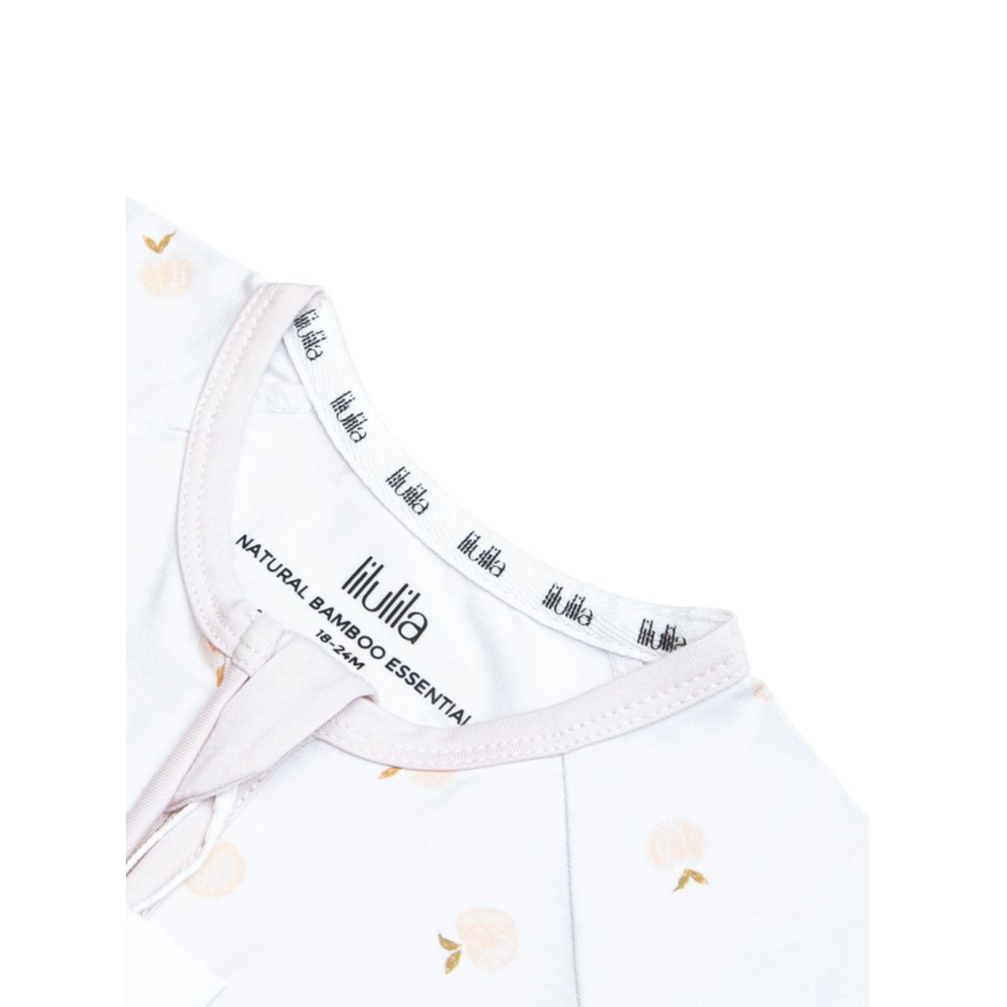 אוברול רוכסן - בגוון קורל רך מעוטר באפרסקים