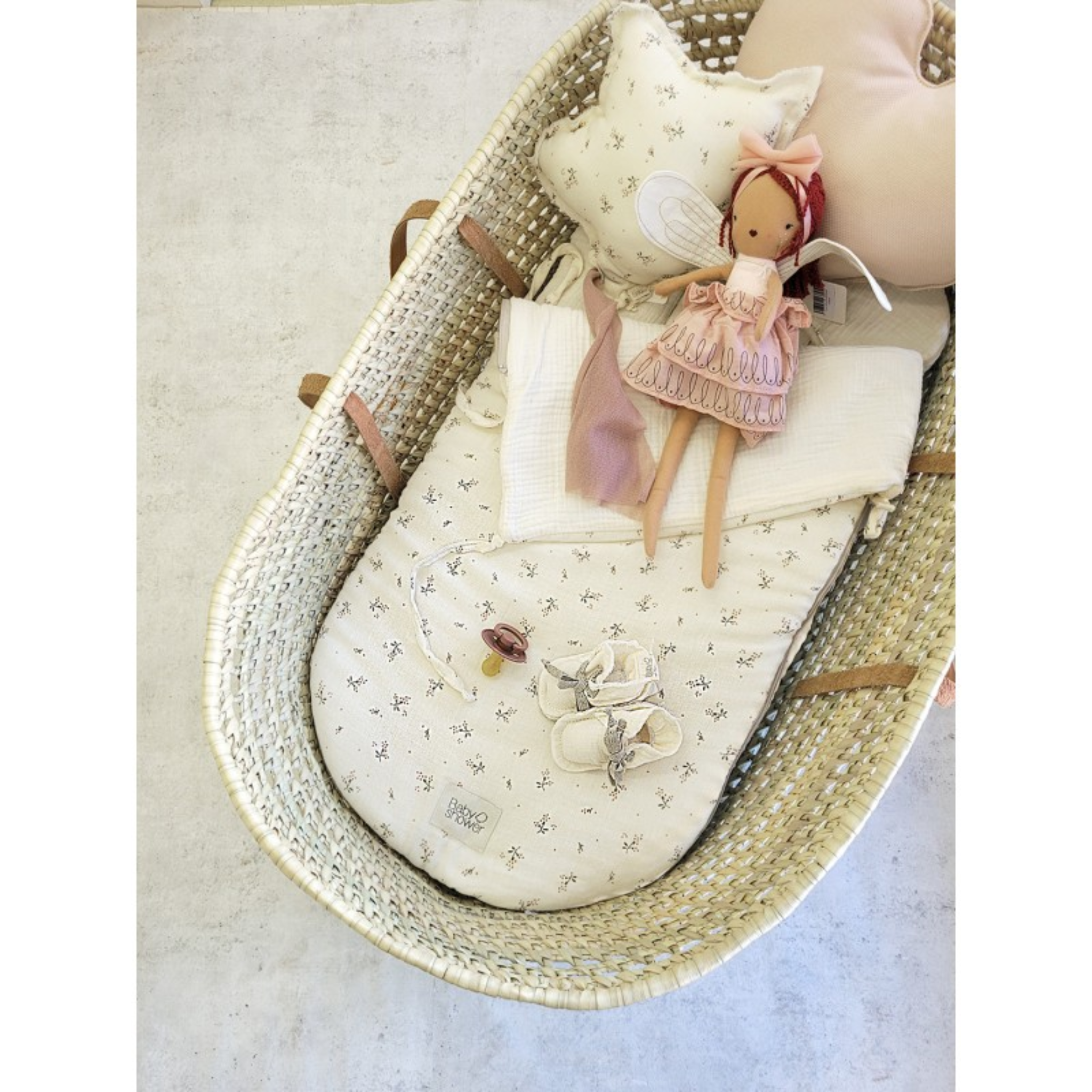 שמיכת חיבוקית משולבת בריפודית מכותנה אורגנית – מעוטרת בדומדמניות